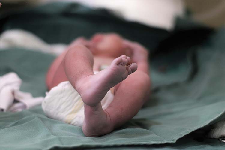 Newborn baby in a diaper